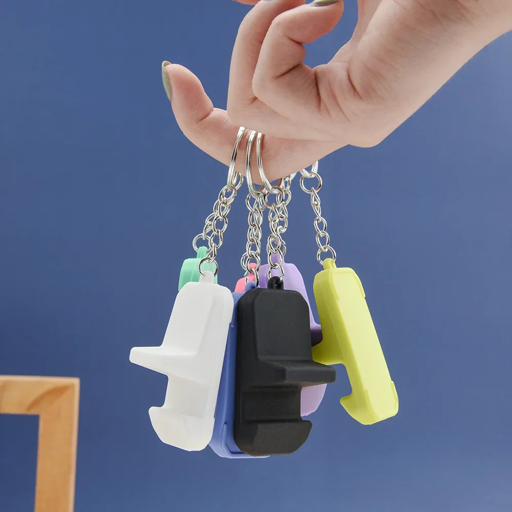 Portable Keychain Mobile Phone Holder: Creative Keyring Stand for iPhone & Samsung - Lightweight Mini Desk Support
