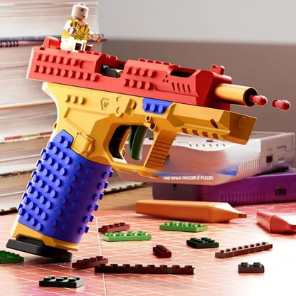 Building Block Toy Gun - Continuous Firing Shell Throwing Pistol with Blowback Design for Outdoor Play & Collectors