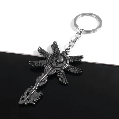 Six-Winged Unborn Metal Keychain - Game Village Inspired Alloy Pendant Keyring & Collectible Gift