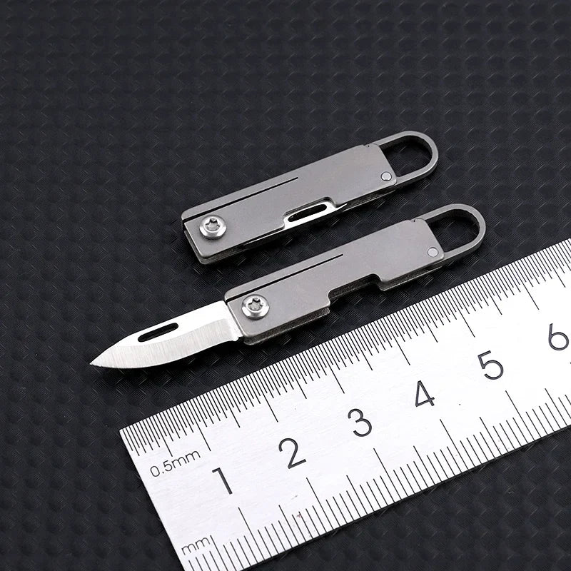 Portable Titanium Alloy Mini Folding Knife Keychain – Sharp Compact Unboxing Tool Pendant