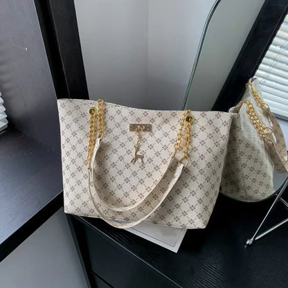 Women’s Large Capacity PU Leather Handbag — Fashion Tote Bag with Textured Design and Hanging Accessories