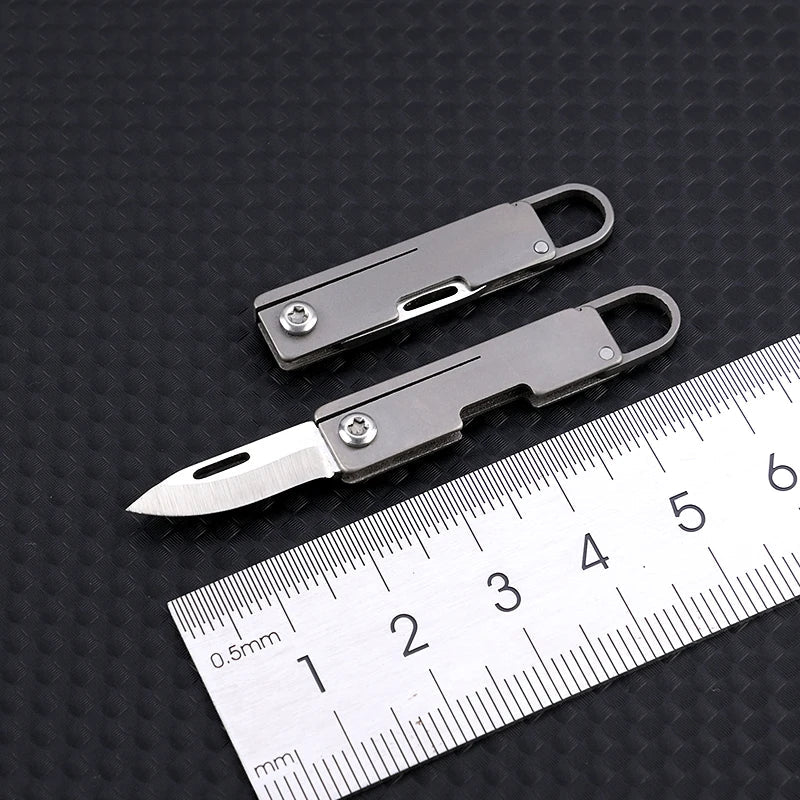 Portable Titanium Alloy Mini Folding Knife Keychain – Sharp Compact Unboxing Tool Pendant