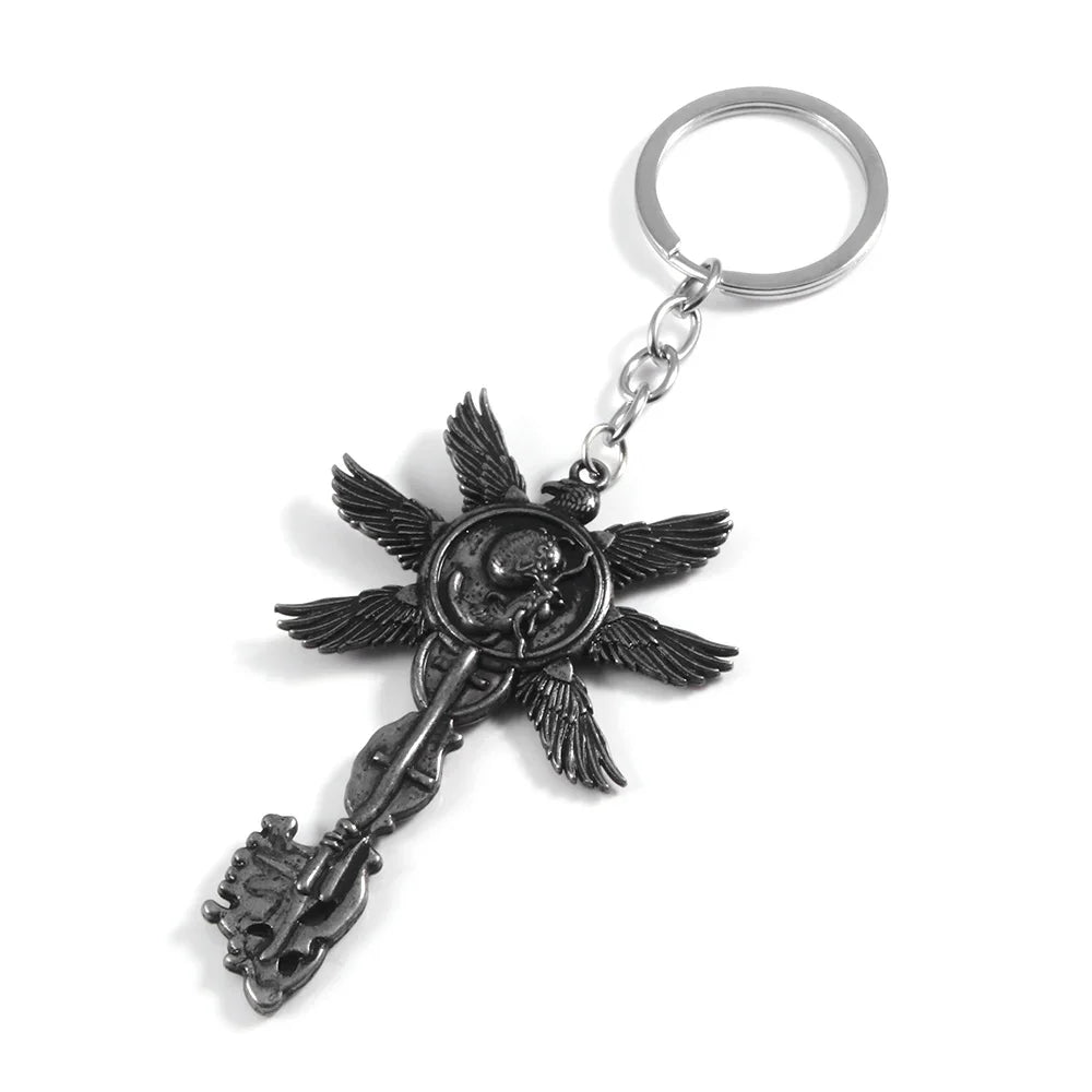 Six-Winged Unborn Metal Keychain - Game Village Inspired Alloy Pendant Keyring & Collectible Gift