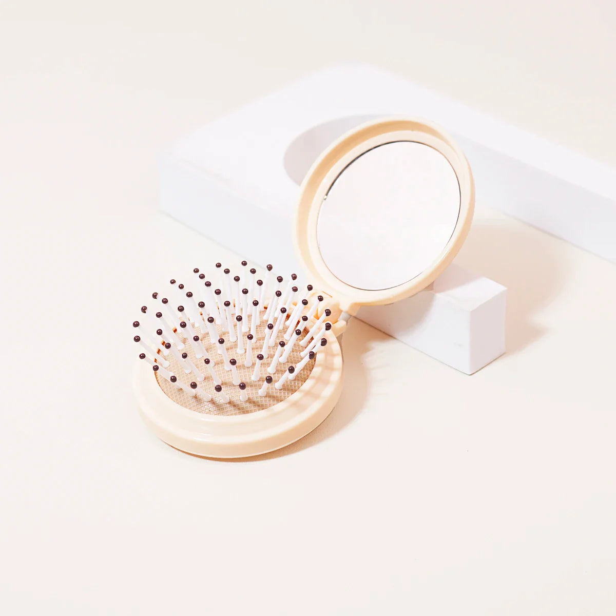 Mini Folding Head Massager & Mirror – Anti-Static Styling Comb for Wigs, Portable Travel Hair Brush