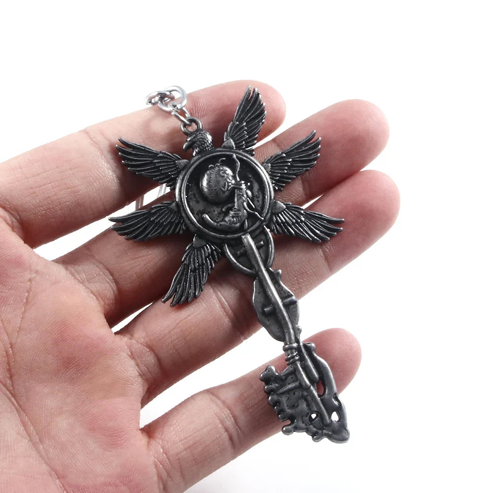 Six-Winged Unborn Metal Keychain - Game Village Inspired Alloy Pendant Keyring & Collectible Gift